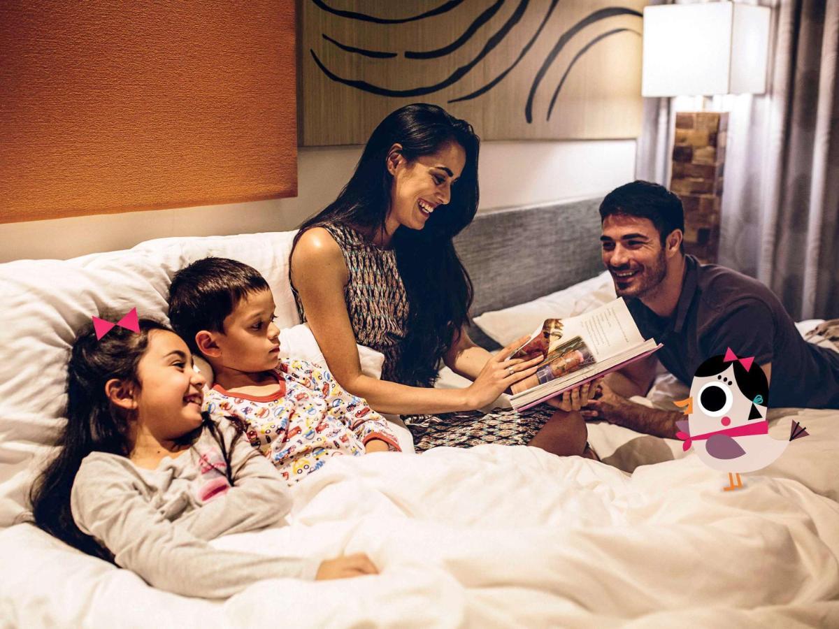 เมอเวนพิค วิลลา แอนด์ เรสซิเดนซ์ ฟู้ก๊วก Hotel ฟู้โกว๊ก ภายนอก รูปภาพ Family at the hotel
