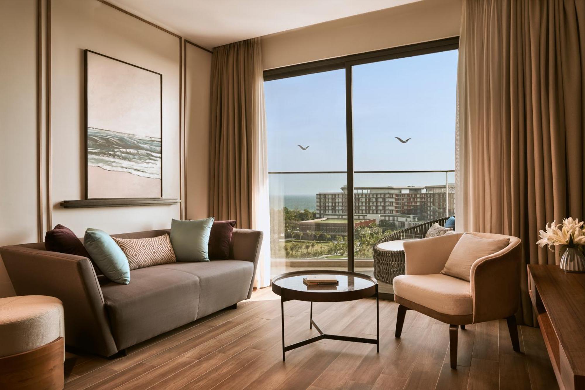 เมอเวนพิค วิลลา แอนด์ เรสซิเดนซ์ ฟู้ก๊วก Hotel ฟู้โกว๊ก ภายนอก รูปภาพ A living room at the hotel